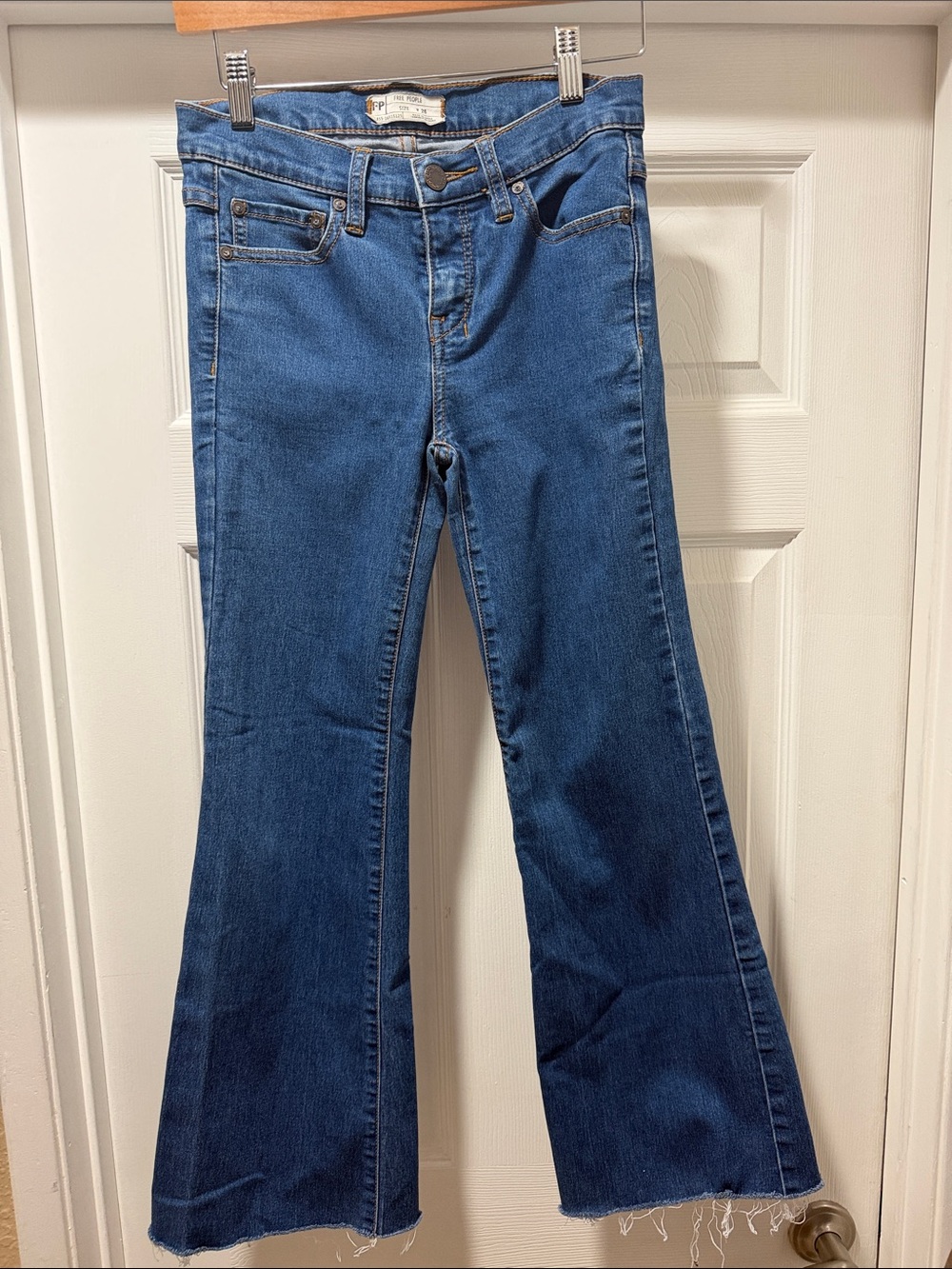 Free People Blue High-Rise Cropped Flare Jeans with Raw Hem